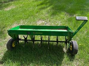 lot 31 image: John Deere Lawn Aerator with Tines and Wheels