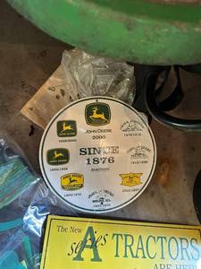 lot 52 image: John Deere Garden and Lawn Decorations including Creative Garden Wind Spinner