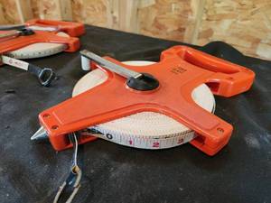 lot 66 image: Open Reel Measuring Tapes with Orange Handles