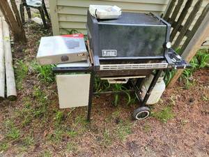 lot 11 image: Used Weber Gas Grill with Accessories and Weather Cover