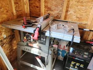 lot 25 image: Craftsman Table Saw with Stand and Safety Gear