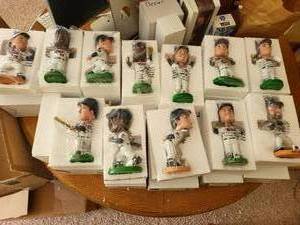 lot 103 image: Complete Set of 12 Minnesota Twins Collectible Bobbleheads 2011 Edition