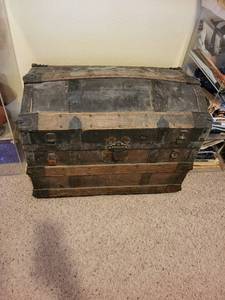 lot 112 image: Antique Camel Backed Steamer Trunk with Rustic Wood and Metal Details