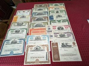 lot 131 image: Collection of 22 Vintage Stock and Bond Certificates