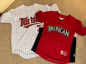 lot 153 image: Set of 2 Joe Mauer Baseball Jerseys - American League and Minnesota Twins