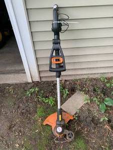 lot 7 image: Battery-Powered String Trimmer by WG163