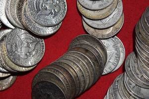 lot 504 image: 75 (SEVENTY FIVE) HALF DOLLARS All 90% SILVER