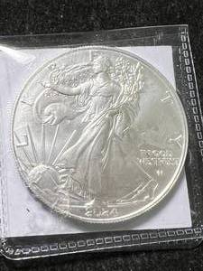 lot 15 image: 2024 AMERICAN SILVER EAGLE 1 TROY OZ .999 FINE SILVER