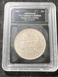 lot 34 image: 1883 US MORGAN SILVER DOLLAR SLABBED VG
