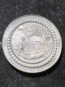lot 35 image: 2 TROY OZ .999 FINE SILVER NEBRASKA ROUND