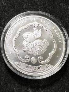 lot 53 image: 1 TROY OZ .999 FINE SILVER 2023 YEAR OF THE RABBIT ROUND IN AIRTITE
