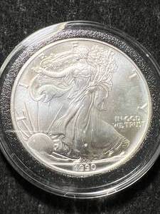 lot 54 image: 1990 AMERICAN SILVER EAGLE 1 TROY OZ .999 FINE SILVER IN AIRTITE