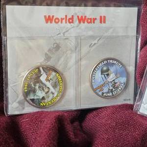 lot 36 image: 10 World War II 50c Coins