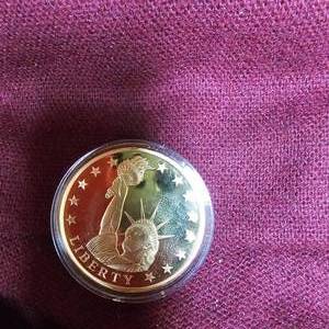 lot 76 image: State of Liberty 24KT Layered Commermerative Coin