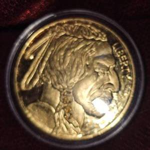lot 87 image: 2011 BuffaloChief Gold Plated Round