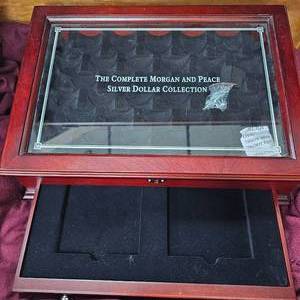 lot 69 image: The Morgan and Peace Dollar Collection Box Empty