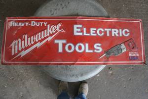 lot 43 image: Milwaukee Tools Tin Sign