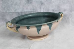 lot 10 image: Vintage Ceramic Bowl with Dual Handles and Green Glaze Accents
