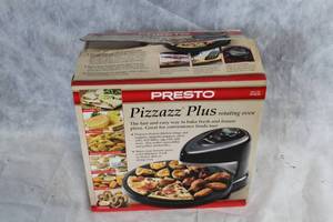lot 90 image: Presto Pizzazz Plus Rotating Oven in Box