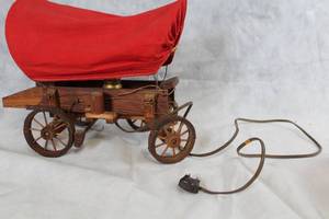lot 94 image: Vintage Wooden Covered Wagon Lamp with Red Canvas Cover