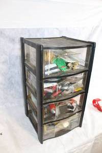lot 96 image: 6-Drawer Plastic Storage Cabinet with Mixed Contents