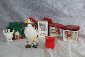 lot 193 image: Holiday Figurine Collection with Penguin, Snowman, and Duck