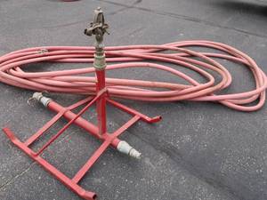 lot 4 image: HEAVY DUTY SPRINKLER SYSTEM & HOSE