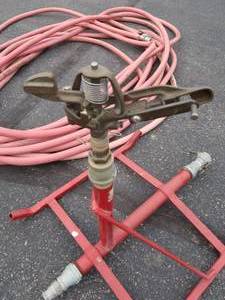 lot 6 image: HEAVY DUTY SPRINKLER SYSTEM & HOSE
