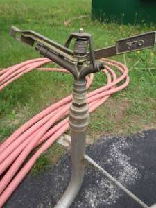 lot 19 image: HEAVY DUTY SPRINKLER SYSTEM & HOSE
