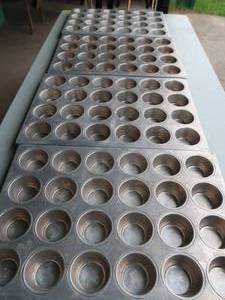 lot 76 image: 4 COMMERCIAL MUFFIN TRAYS.