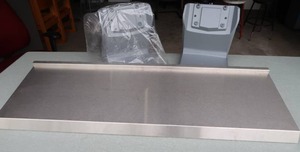 lot 79 image: STAINLESS SHELF  NAPKIN DISPENSER HOLDERS