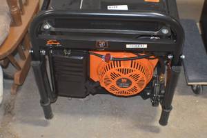 lot 73 image: WEN DF1100X 11,000-Watt 120V240V Dual Fuel Portable Generator with Wheel Kit, Electric Start, and CO Watchdog