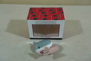 lot 73 image: Novelty Magnetic Salt & Pepper Shaker -Shark and Leg