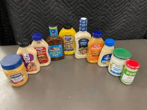 lot 49 image: NE 1 - Collection of Assorted Condiments Including Aioli, Mayo, and Dressing