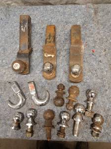 lot 23 image: Collection of 13 Trailer Hitch Ball Mounts and Hooks