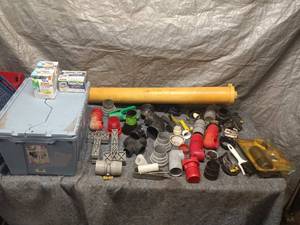 lot 29 image: Collection of Plumbing Parts and RV Waste Treatment Products
