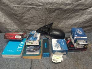 lot 30 image: Automotive Parts and Manuals Lot including Brake Pads and Side Mirror
