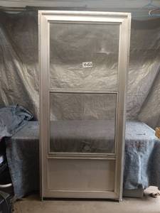 lot 35 image: Aluminum Storm Door with Screen Insert, 30x80