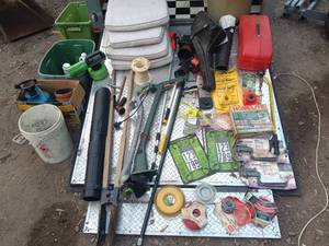 lot 45 image: Outdoor Lawn and Garden Equipment Collection with Homelite Parts