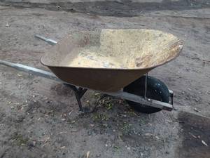 lot 46 image: Used Metal Wheelbarrow with Single Wheel and Wooden Handles