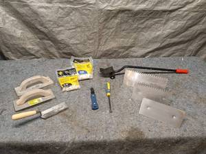 lot 58 image: Assorted Masonry Tools and Supplies Set