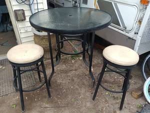 lot 63 image: Outdoor Glass Top Patio Table with 2 Bar Stools