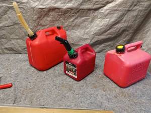 lot 71 image: Set of 3 Red Plastic Fuel Containers with Spouts