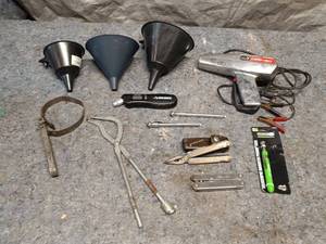 lot 80 image: Automotive Tool Set with Leatherman, Timing Light, and Funnels