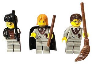 lot 073 image: LEGO Harry Potter MINIFIGURE Bundle  Harry Potter - Hermione Granger - Ron Weasley - Qty 3  Year 2000