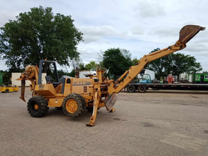lot 6 image: 1996 Case 860 4 x 4 x 4 Cable Blow With Front Mount Backhoe Attachment