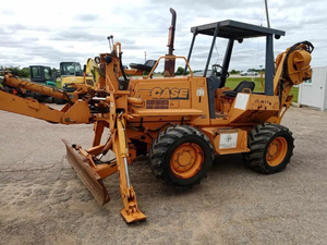 lot 8 image: 2000 Case 860 4 x 4 x 4 Cable Plow With Front Mount Backhoe Attachment