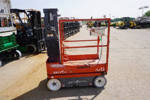 lot 10 image: 2016 Sky Jack Model SJ12 Vertical Electric Mast Lift