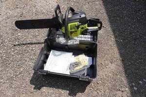 lot 24 image: Poulan Model 4018 Chain Saw With Case 16 Bar