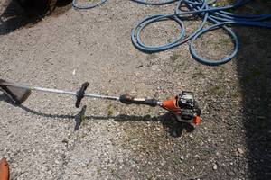 lot 31 image: Stihl Gas Powered Weed Trimmer